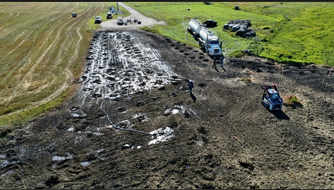 Aerial view of RemediMaker remediation site with tanker truck and equipment